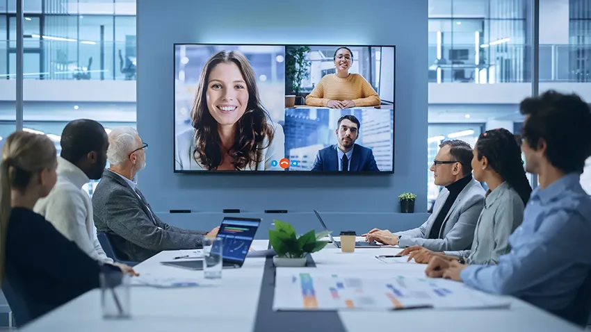 Group of people having a video conference business meeting.